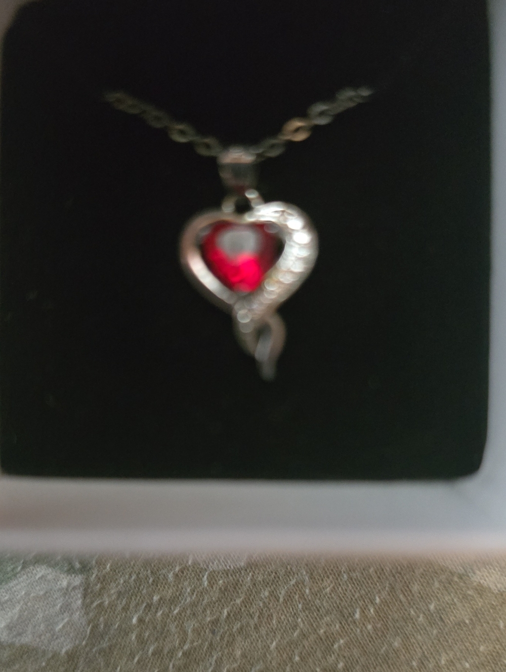 Silver Heart Necklace with Red Gemstone Pendant
